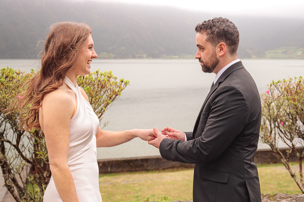 Bride and groom during ring exchange moment on an elopement in the Azores