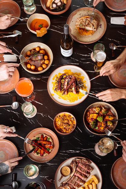Image of a table full of dishes durng a food photography session in the Azores